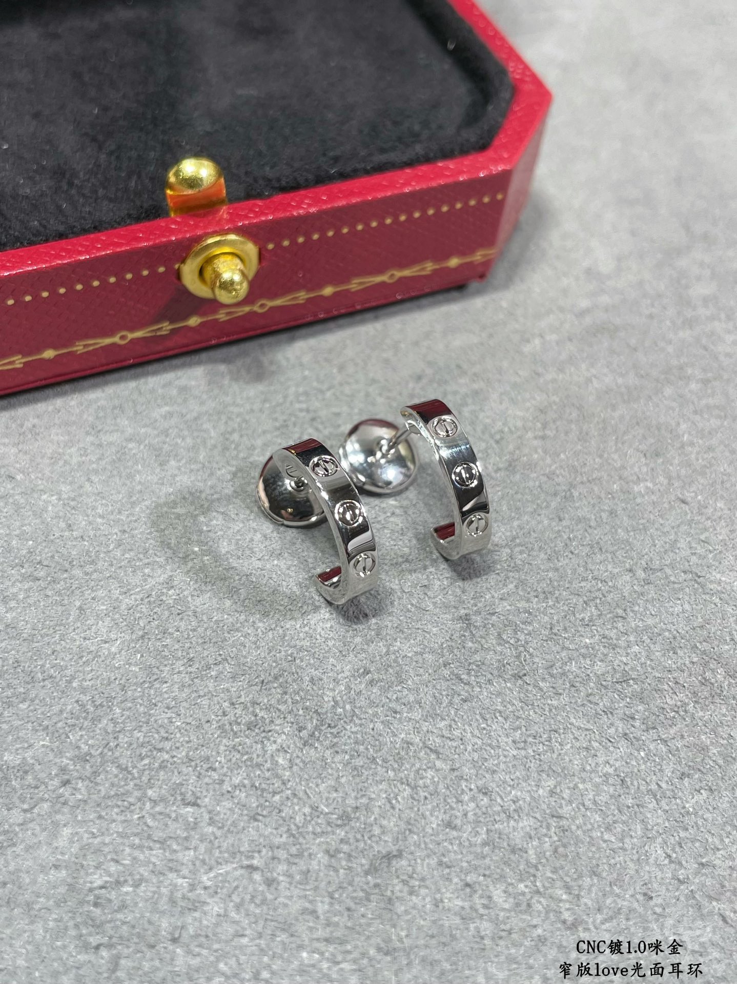 Cartier LOVE earrings 18k yellow gold 18k white gold no gemstones polished plain metal finish narrow version hoop earrings inner diameter approximately 8mm