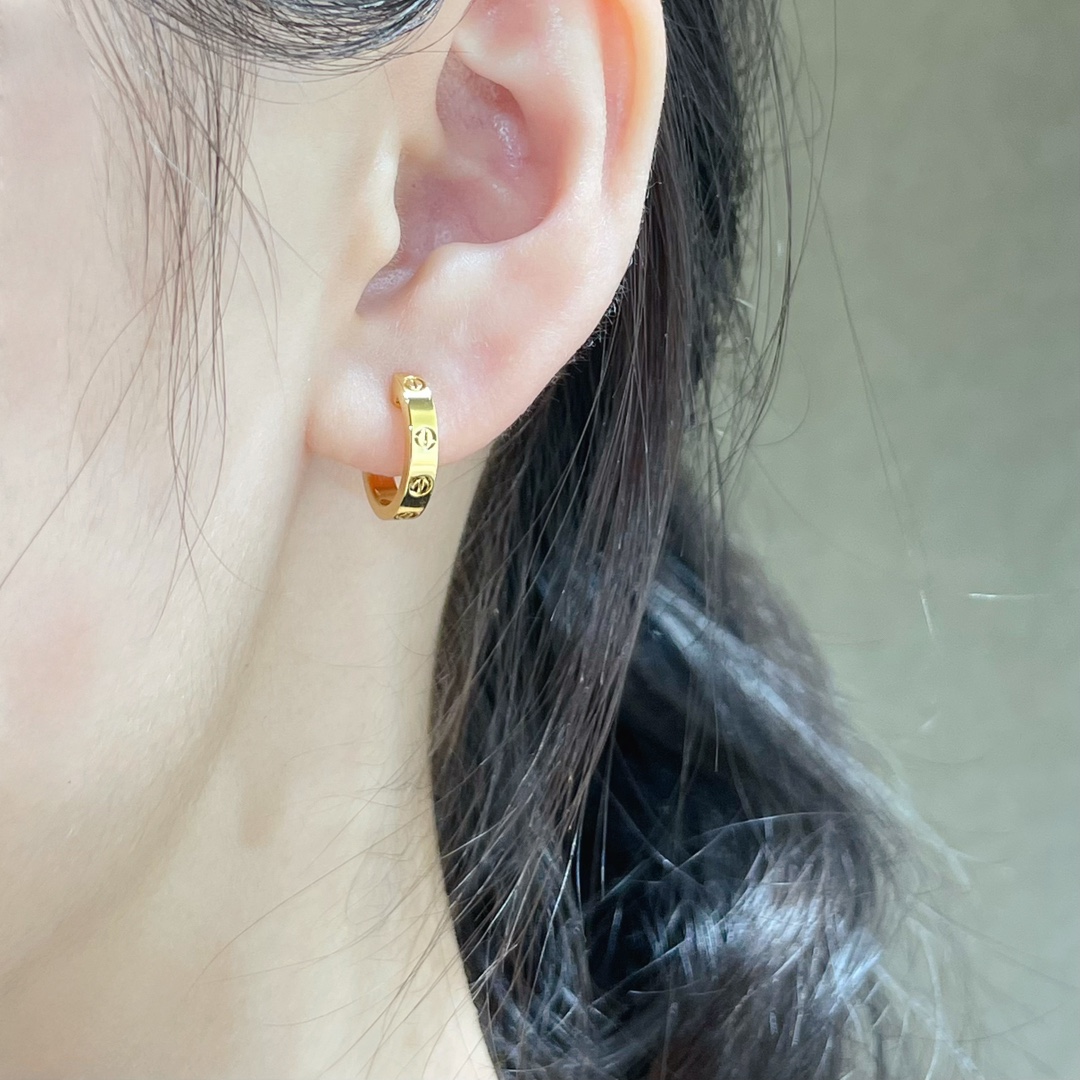 Cartier LOVE earrings 18k yellow gold 18k white gold no gemstones polished plain metal finish narrow version hoop earrings inner diameter approximately 8mm