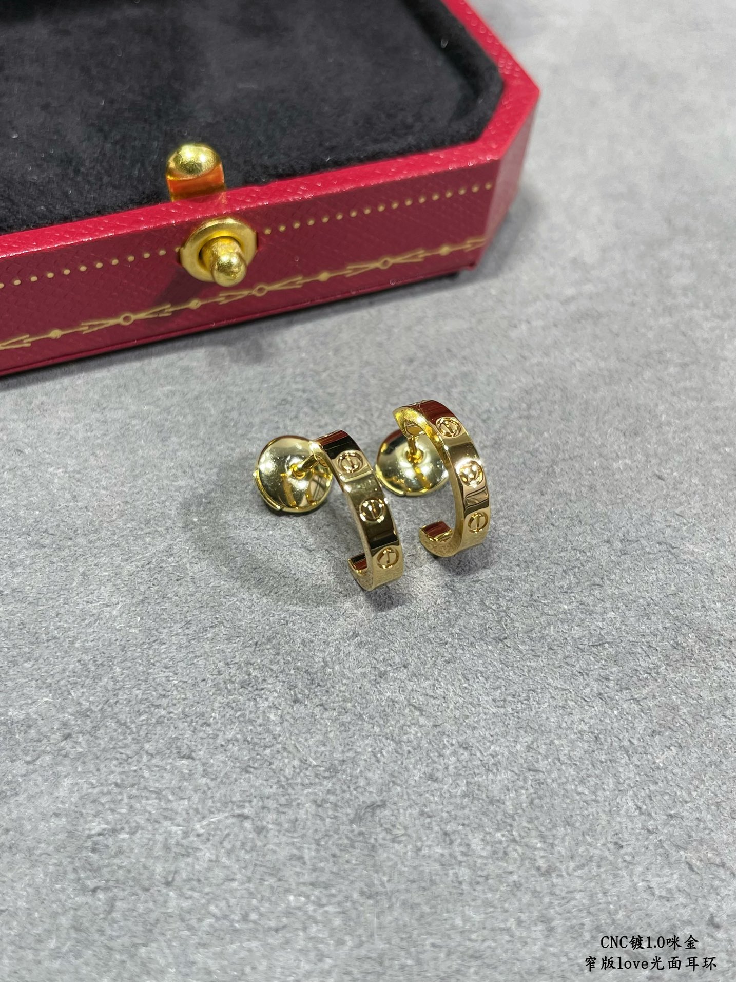 Cartier LOVE earrings 18k yellow gold 18k white gold no gemstones polished plain metal finish narrow version hoop earrings inner diameter approximately 8mm