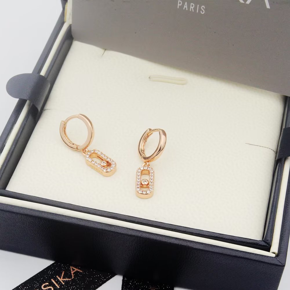 Messika Move Uno Hoop earrings Available in white gold rose gold yellow gold metal options with clear diamond accents 12mm hoop diameter