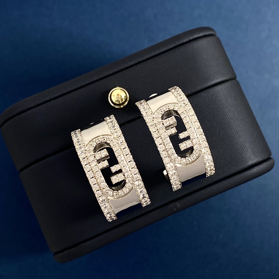 Fendi O Lock earrings Gold-tone metal with clear crystal accents gold variant Silver-tone metal with clear crystal accents silver variant 1 5cm hoop diameter