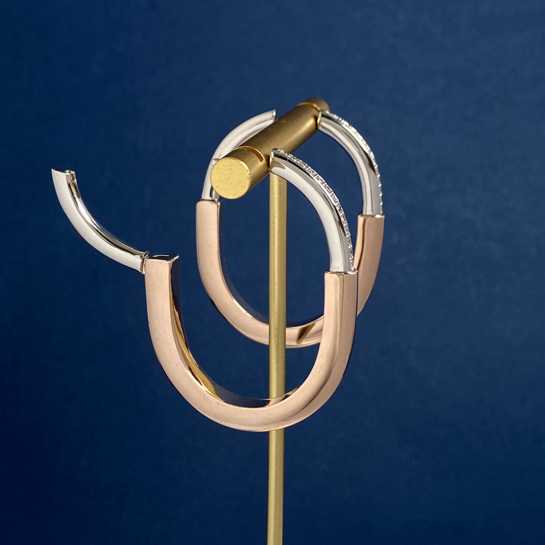 Tiffany Lock Hoop Earrings earrings Yellow gold with clear diamond accents available in white gold and rose gold variants 25mm hoop diameter