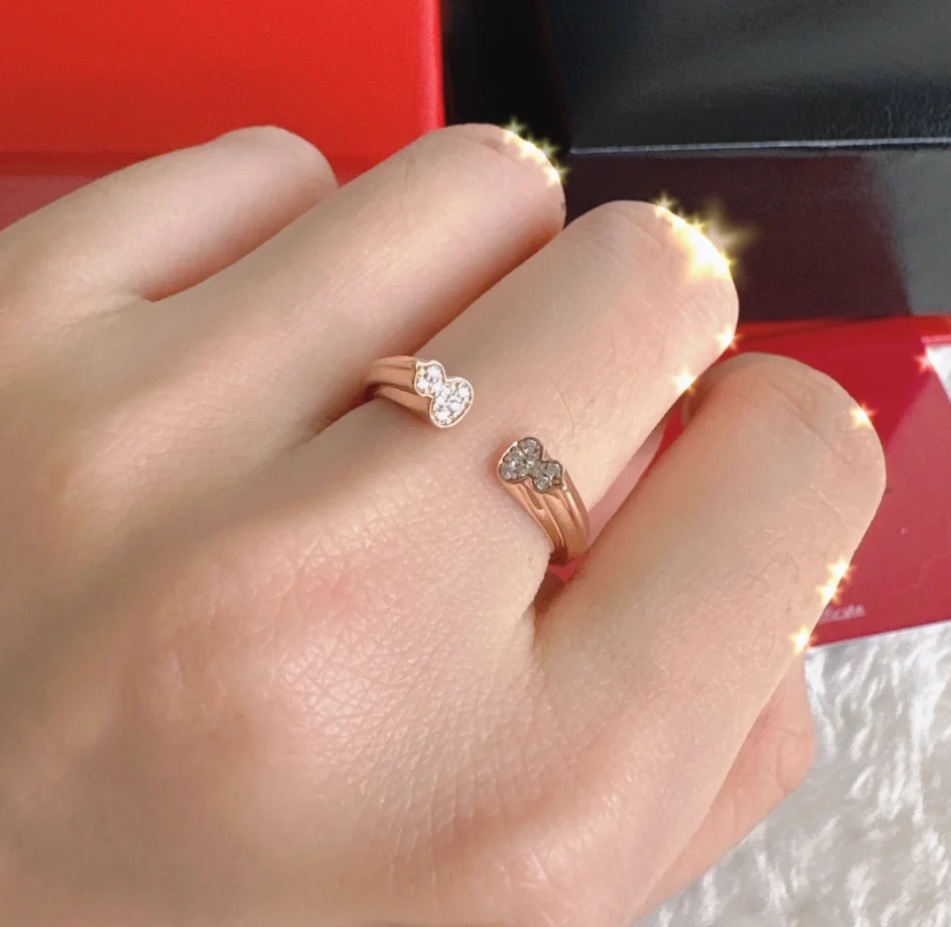 Qeelin Wulu ring rose gold with clear diamond accents adjustable open band