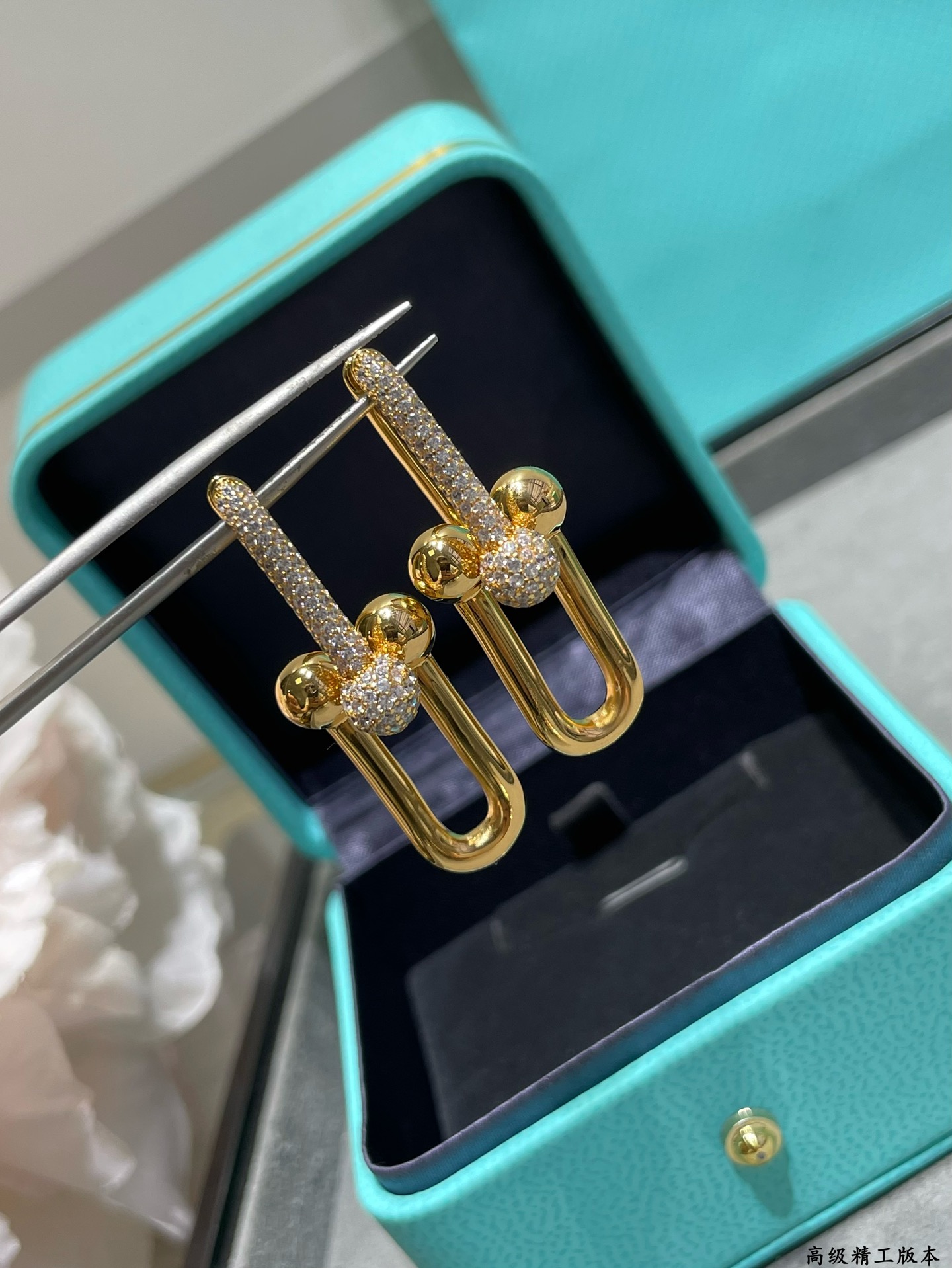 Tiffany HardWear earrings Available in 18k yellow gold 18k rose gold and sterling silver with pave set clear diamonds 3 5cm drop length