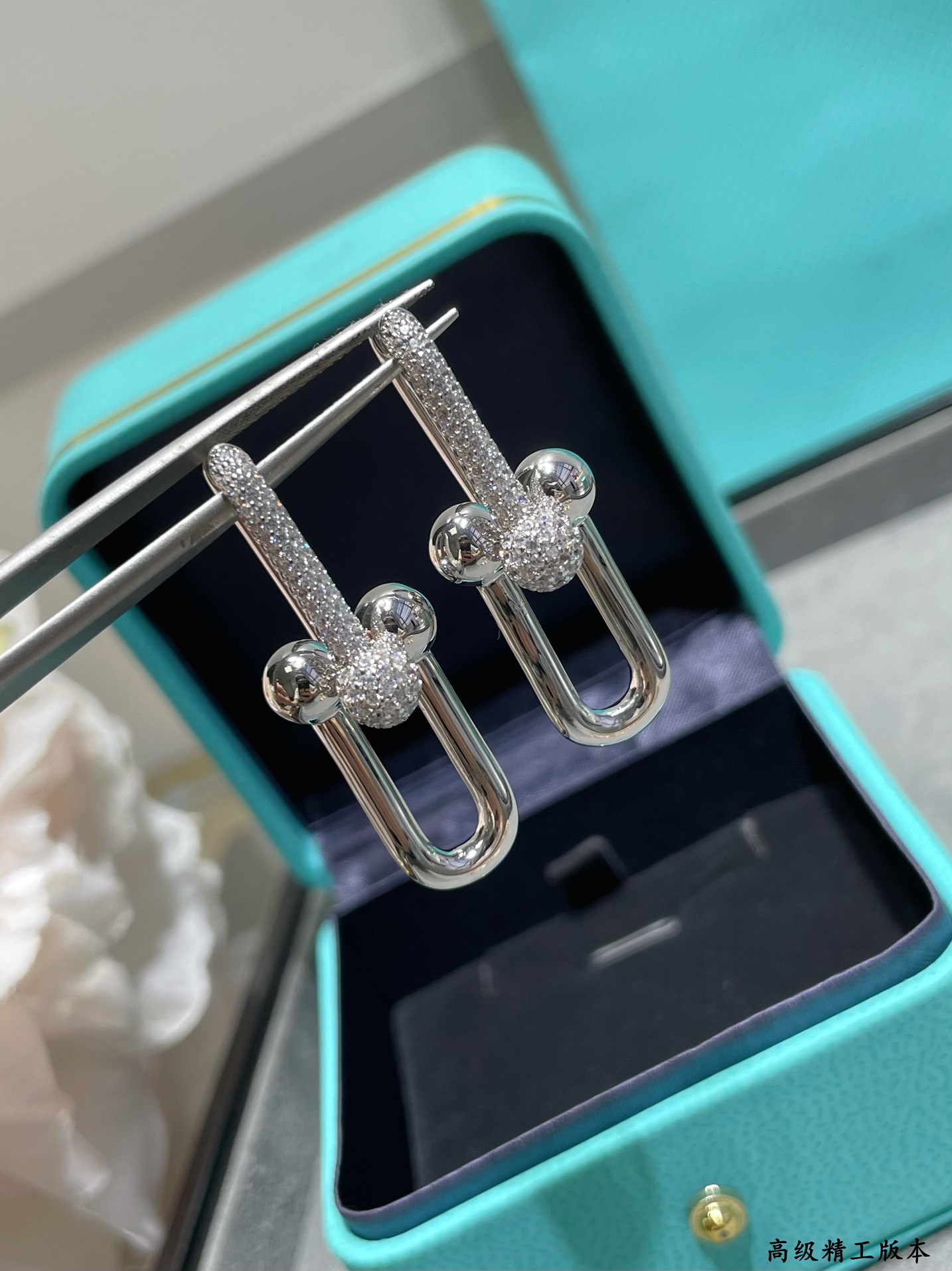 Tiffany HardWear earrings Available in 18k yellow gold 18k rose gold and sterling silver with pave set clear diamonds 3 5cm drop length