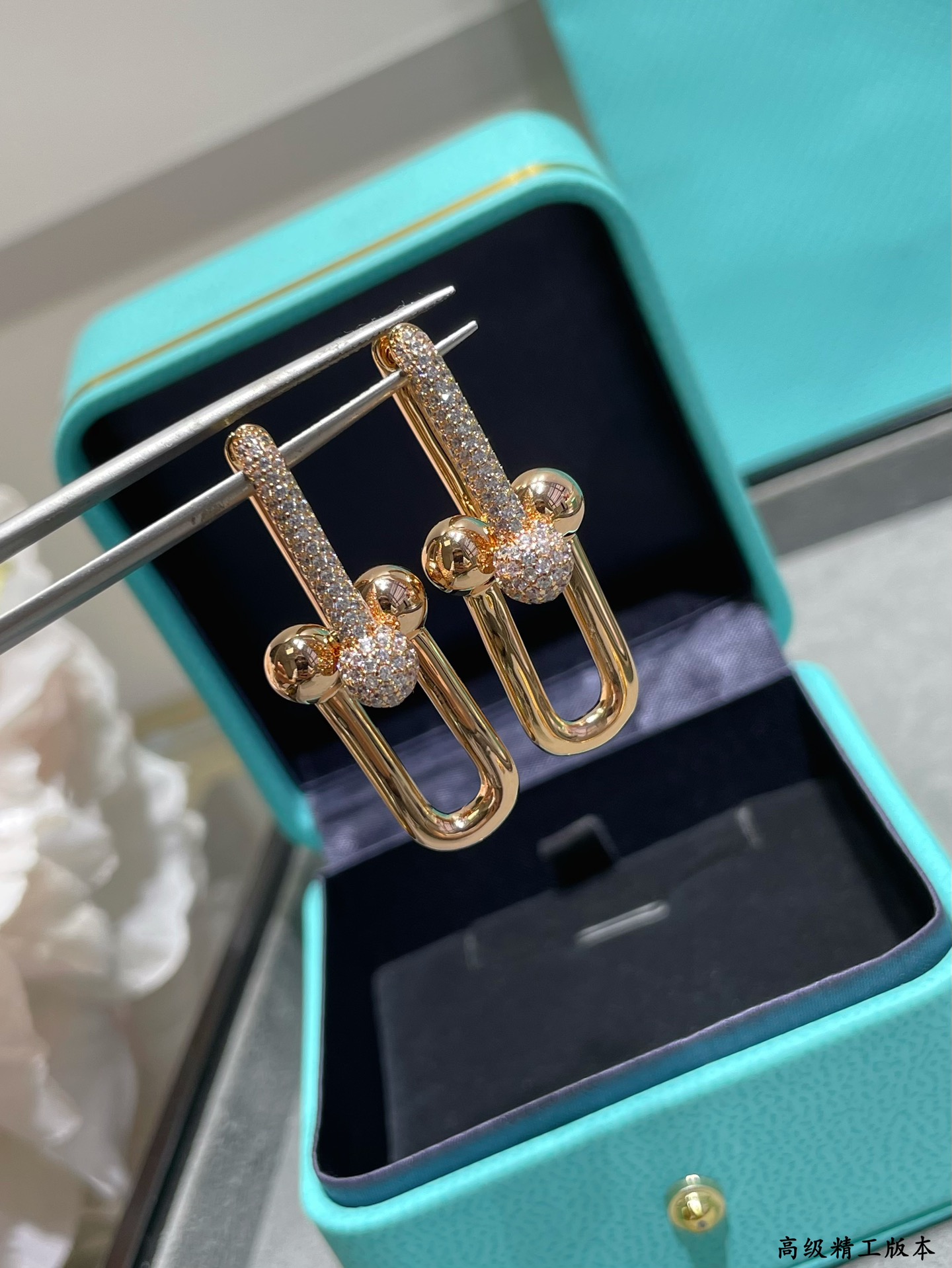 Tiffany HardWear earrings Available in 18k yellow gold 18k rose gold and sterling silver with pave set clear diamonds 3 5cm drop length