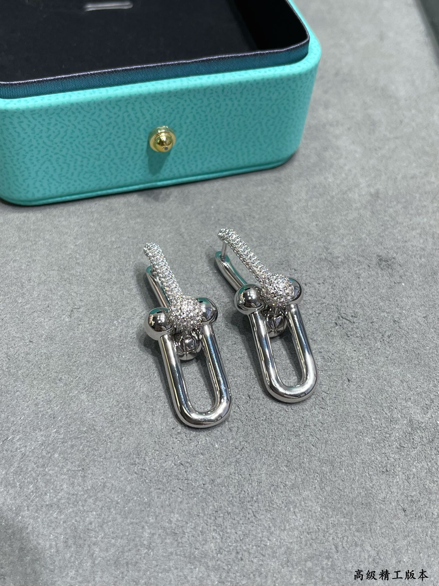 Tiffany HardWear earrings Available in 18k yellow gold 18k rose gold and sterling silver with pave set clear diamonds 3 5cm drop length