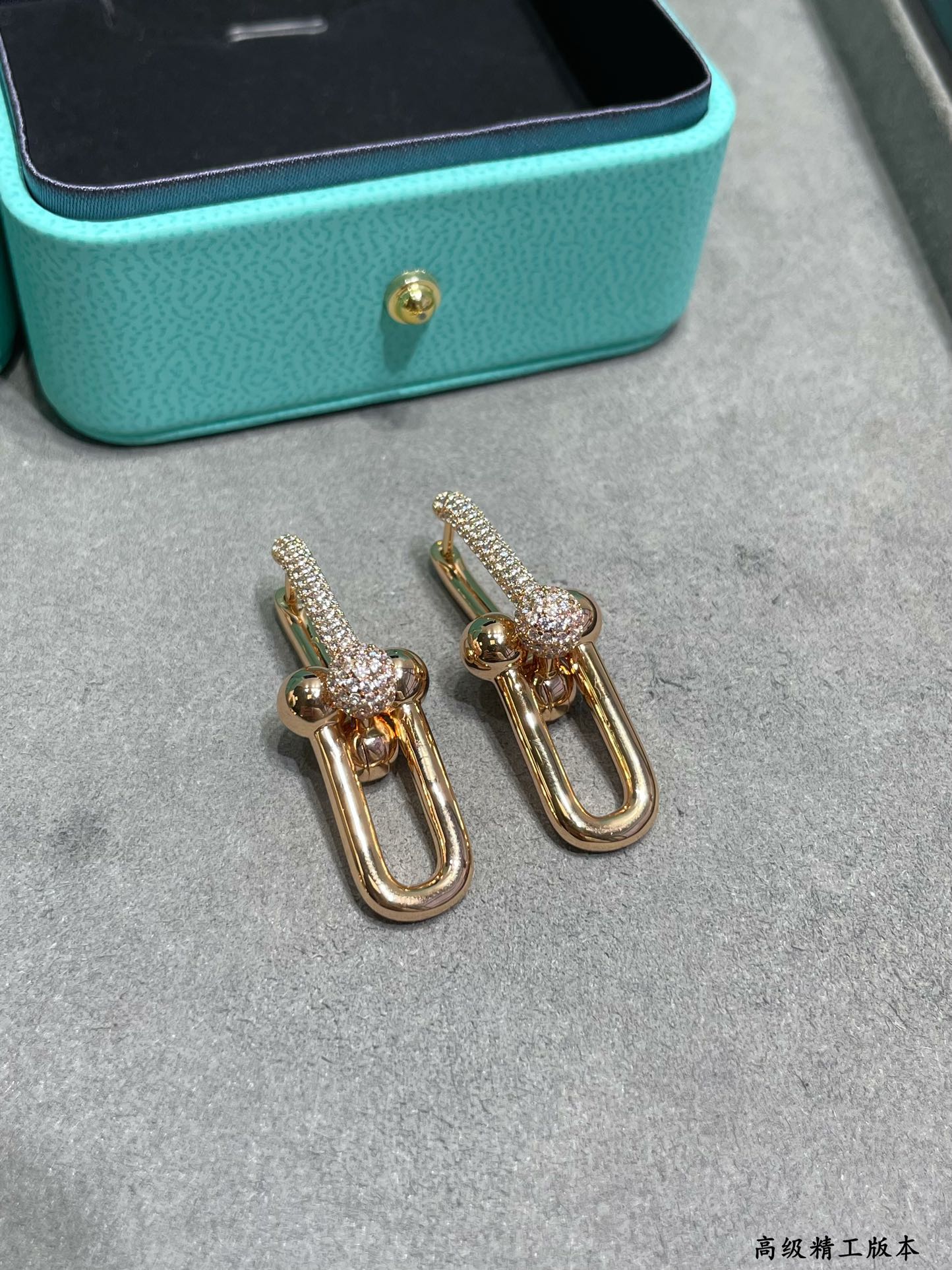 Tiffany HardWear earrings Available in 18k yellow gold 18k rose gold and sterling silver with pave set clear diamonds 3 5cm drop length