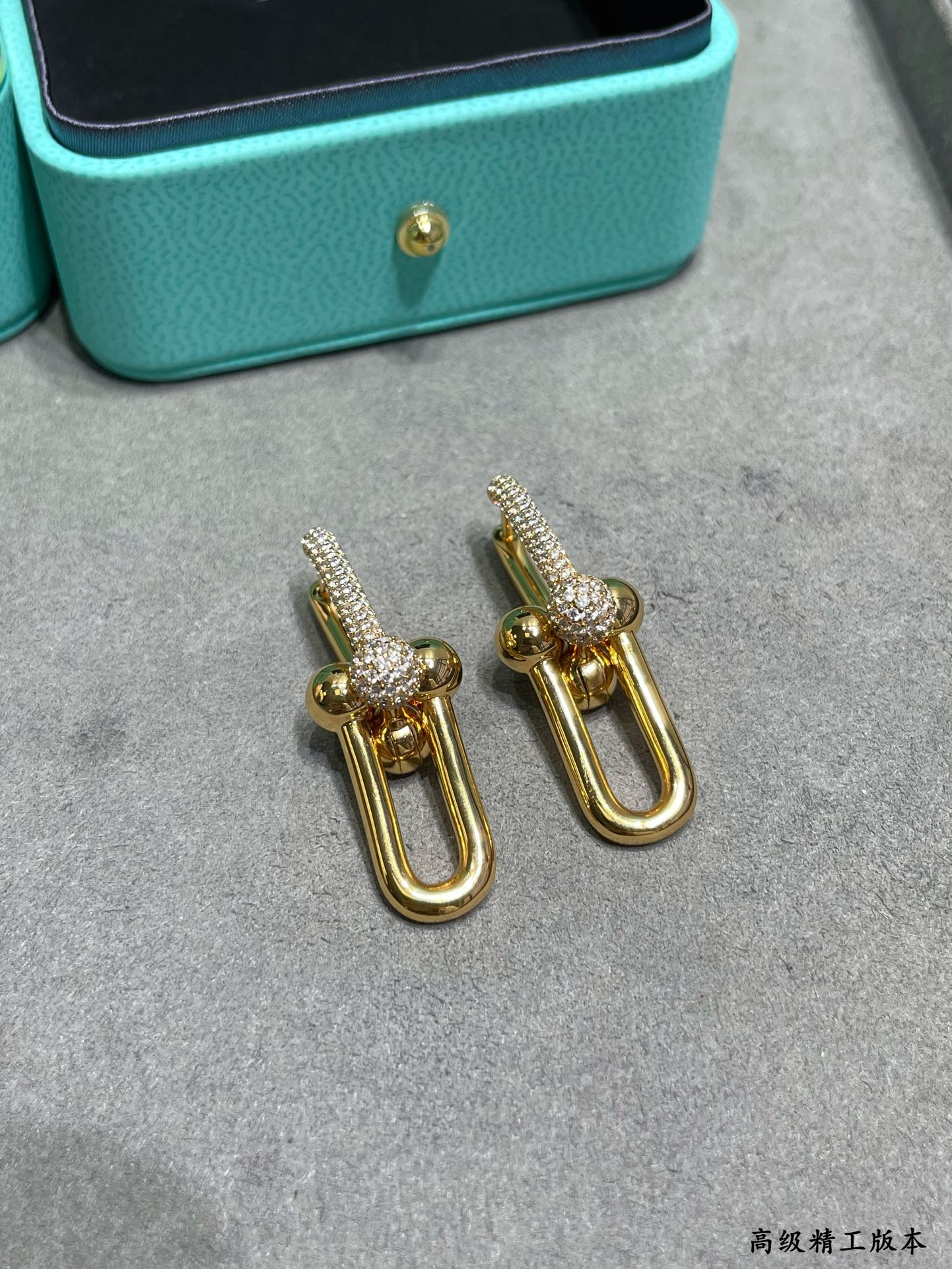 Tiffany HardWear earrings Available in 18k yellow gold 18k rose gold and sterling silver with pave set clear diamonds 3 5cm drop length