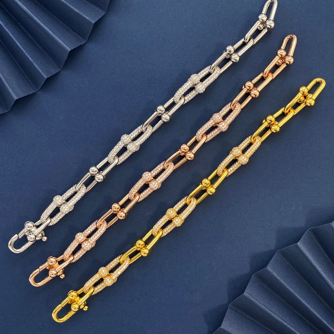 Bracelet Tiffany HardWear Métal argenté avec pavés transparents Métal doré rose avec pavés transparents Métal doré jaune avec pavés transparents 7 pouces