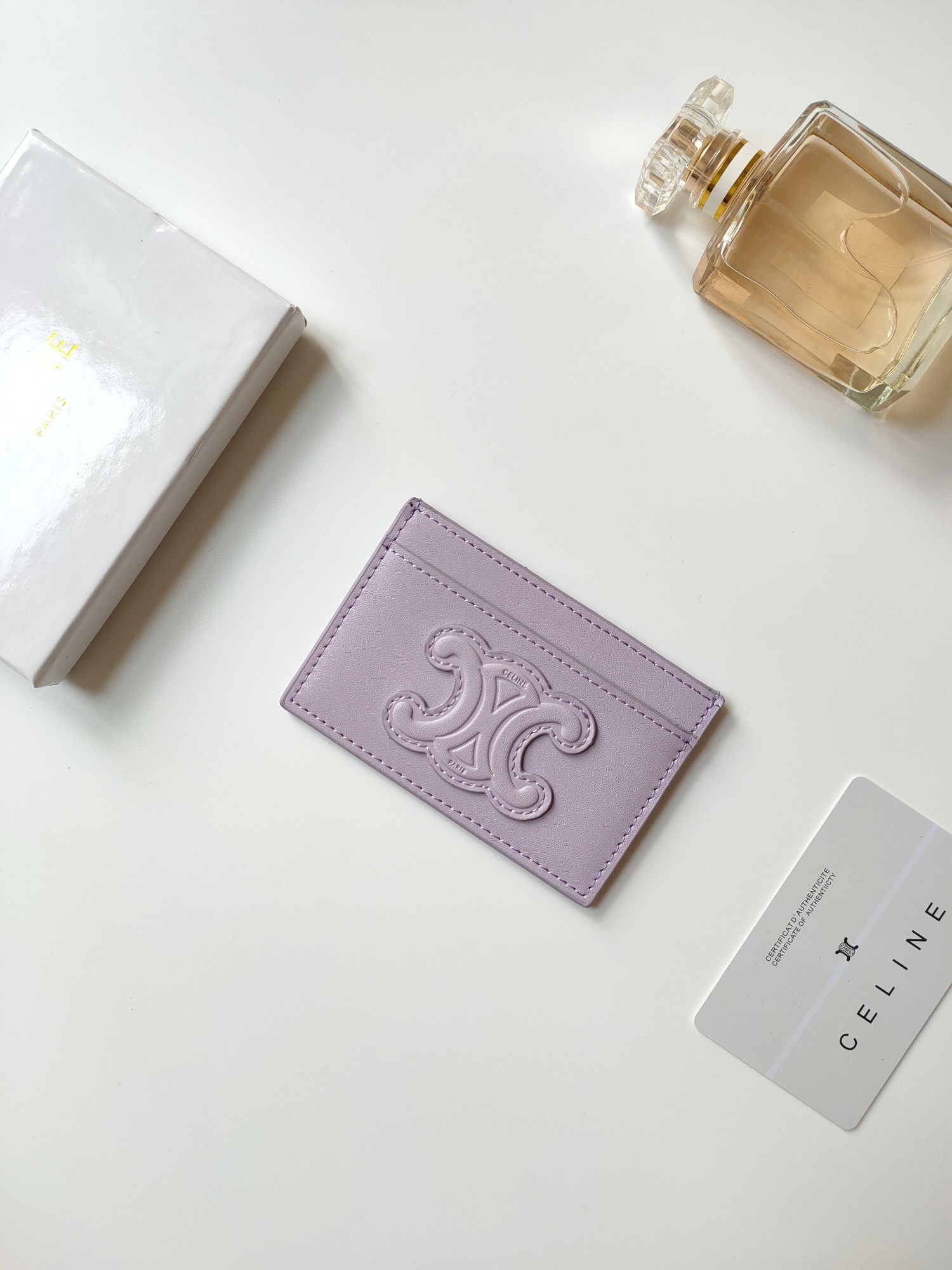 Celine Triomphe card holder light lavender smooth leather with matching tone embossed Triomphe logo 10 5 x 7cm