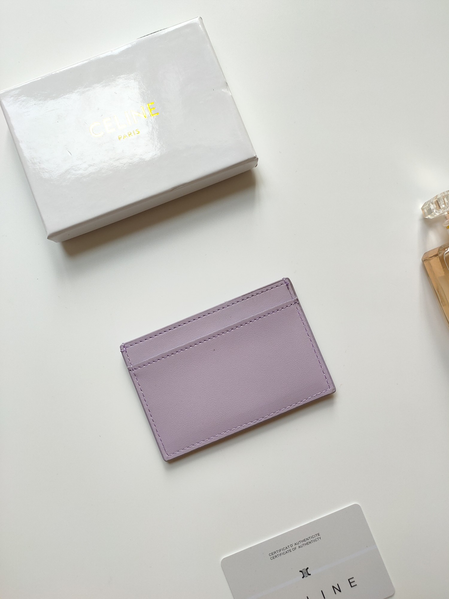 Celine Triomphe card holder light lavender smooth leather with matching tone embossed Triomphe logo 10 5 x 7cm