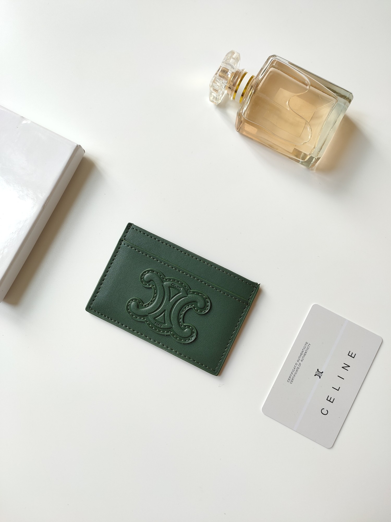 Celine Triomphe card holder dark green smooth leather no additional metal or stone accents 10 5 x 7cm