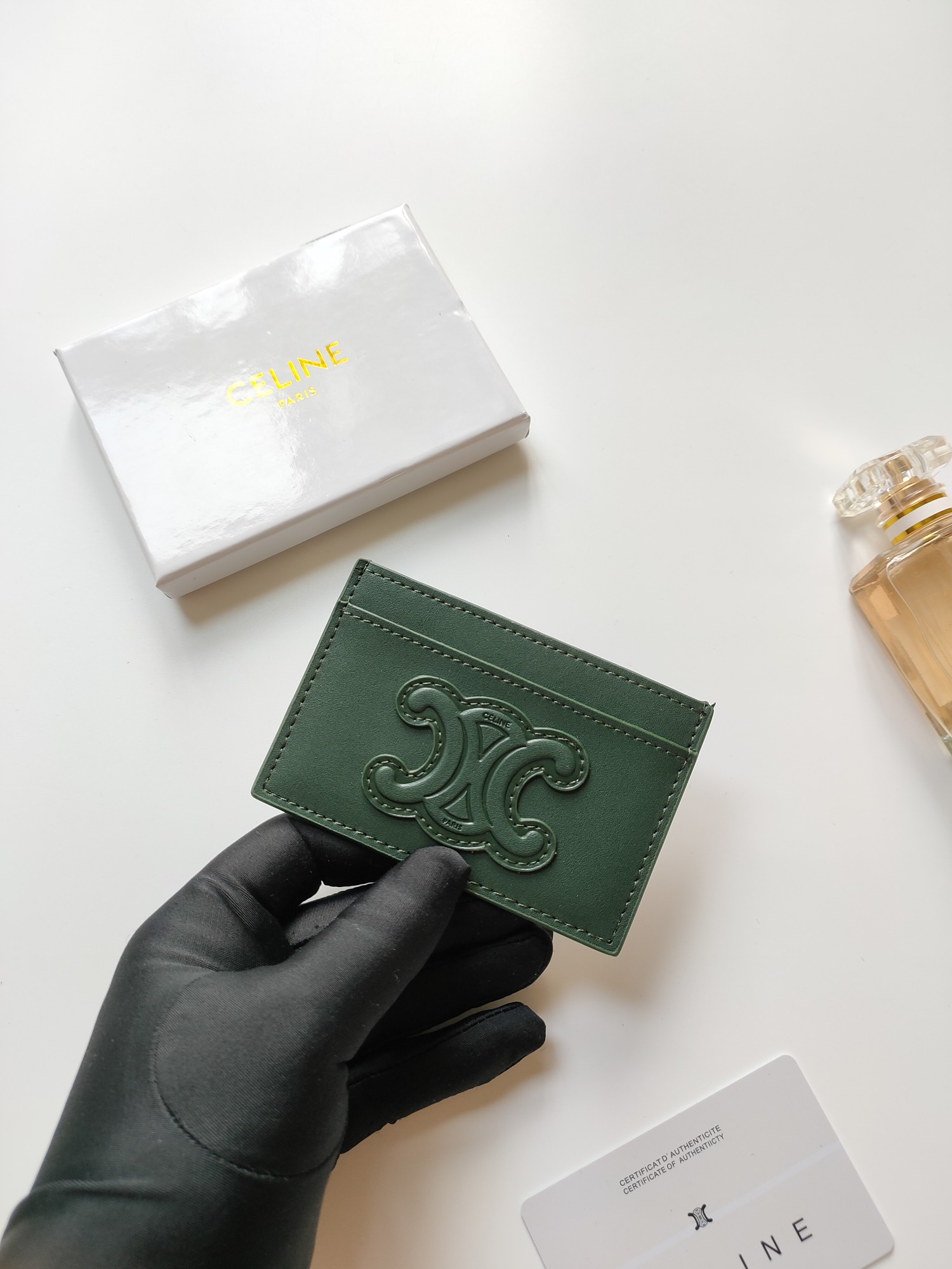 Celine Triomphe card holder dark green smooth leather no additional metal or stone accents 10 5 x 7cm