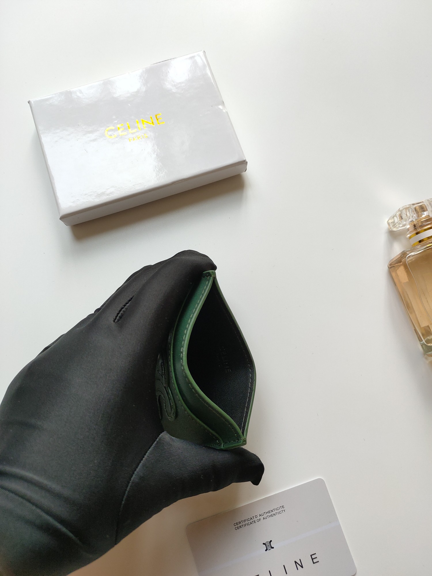 Celine Triomphe card holder dark green smooth leather no additional metal or stone accents 10 5 x 7cm