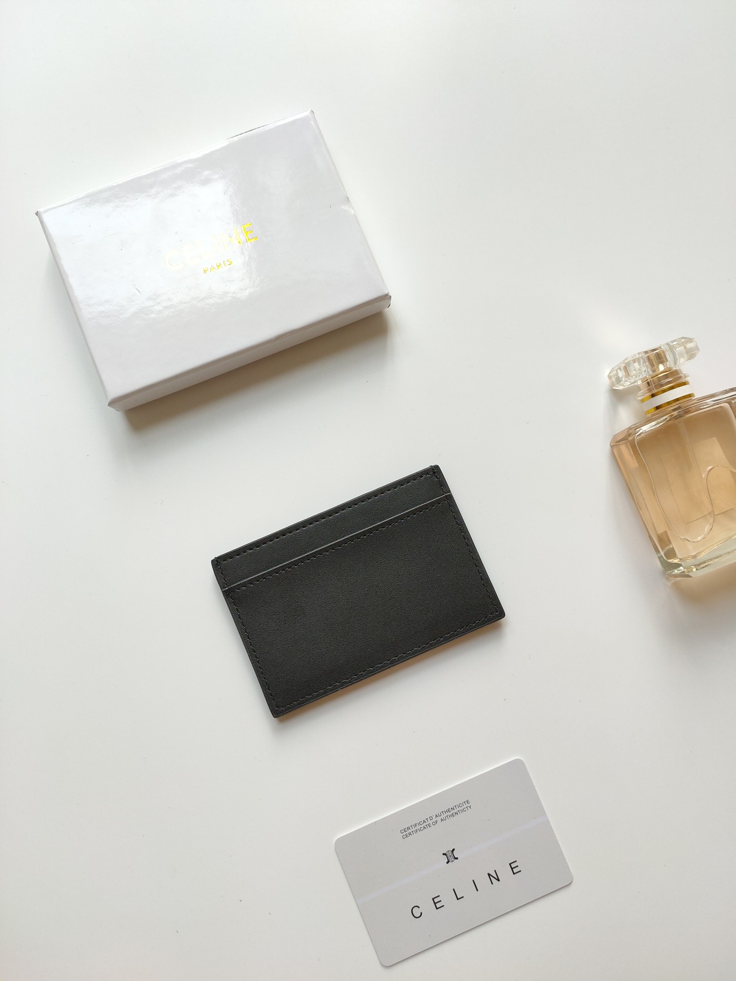 Celine Triomphe card holder black smooth leather with black embossed Triomphe logo 10 5 x 7cm