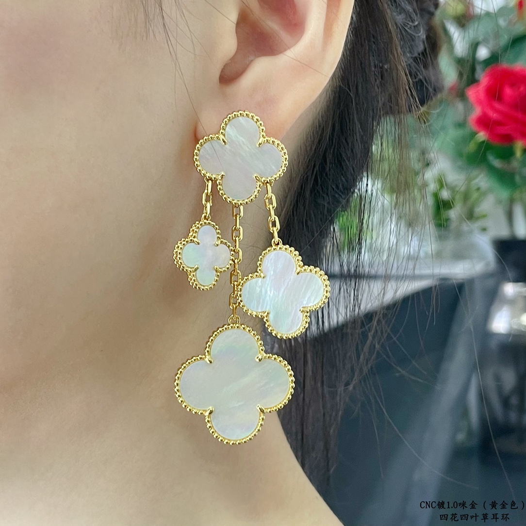 Van Cleef Arpels Magic Alhambra earrings Yellow gold white gold toned metal with white mother-of-pearl clover inlays 4 motifs per ear drop length approximately 6 5cm