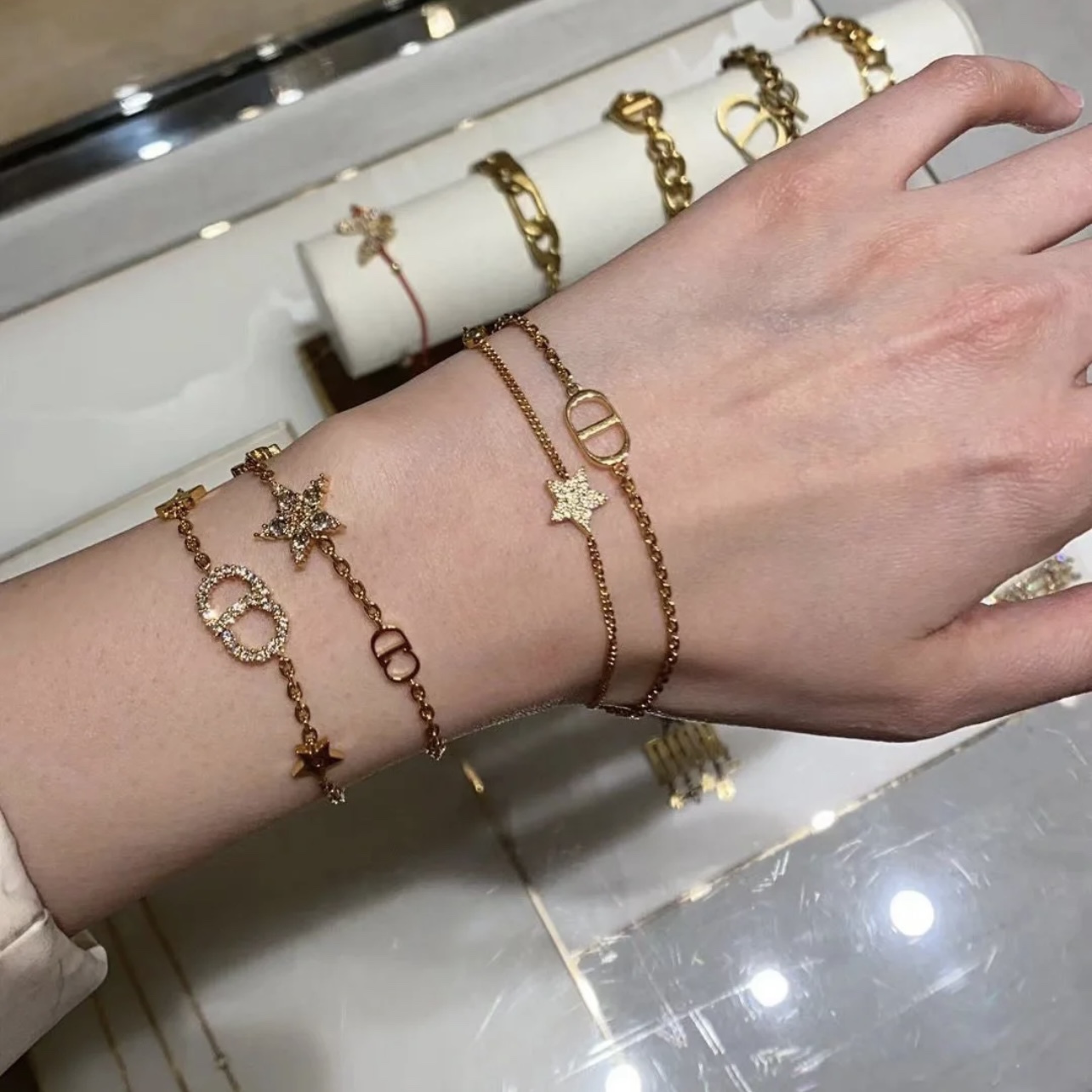 Dior Petit CD Lucky Charms bracelet gold-tone metal with clear crystal accents 17cm with 3cm extender