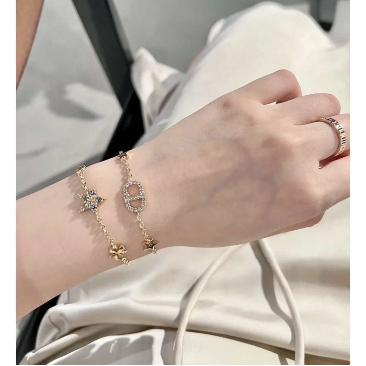 Dior Petit CD Lucky Charms bracelet gold-tone metal with clear crystal accents 17cm with 3cm extender