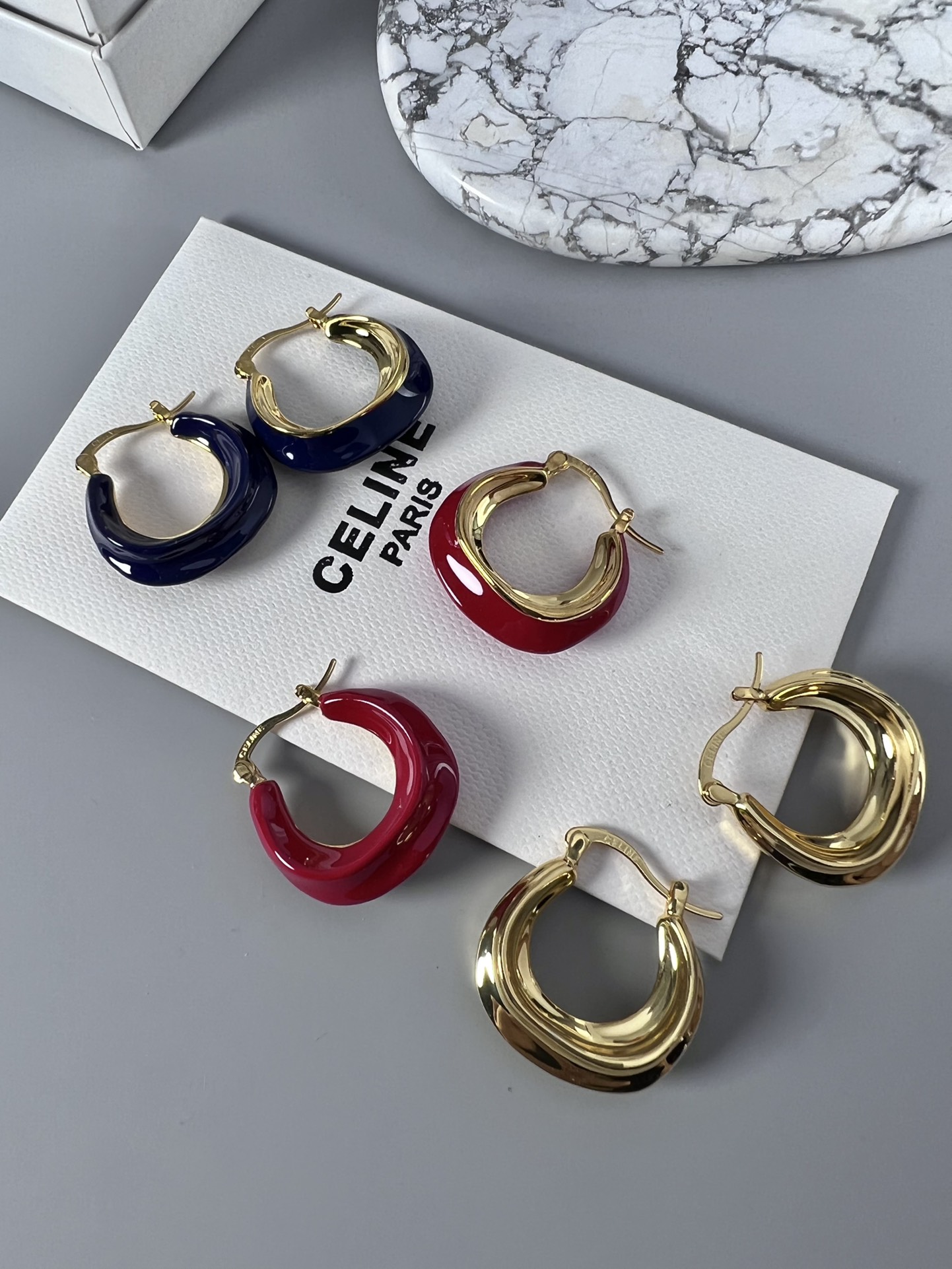 Celine Layered Hoop Earrings earrings Gold-tone metal one variant with navy blue enamel one variant in polished gold 2 5cm diameter