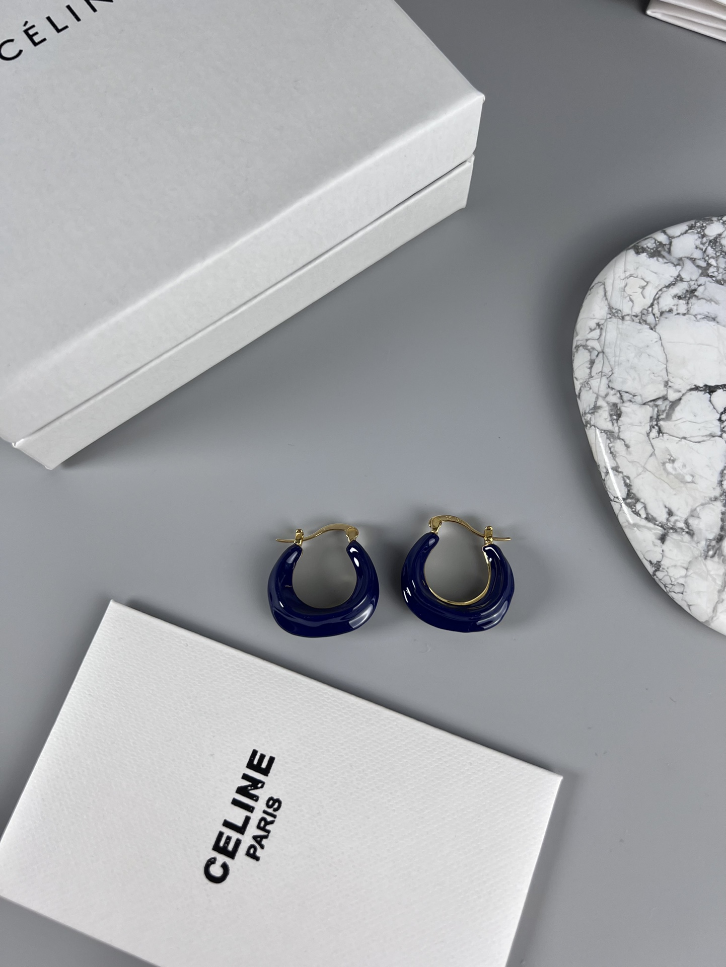 Celine Layered Hoop Earrings earrings Gold-tone metal one variant with navy blue enamel one variant in polished gold 2 5cm diameter