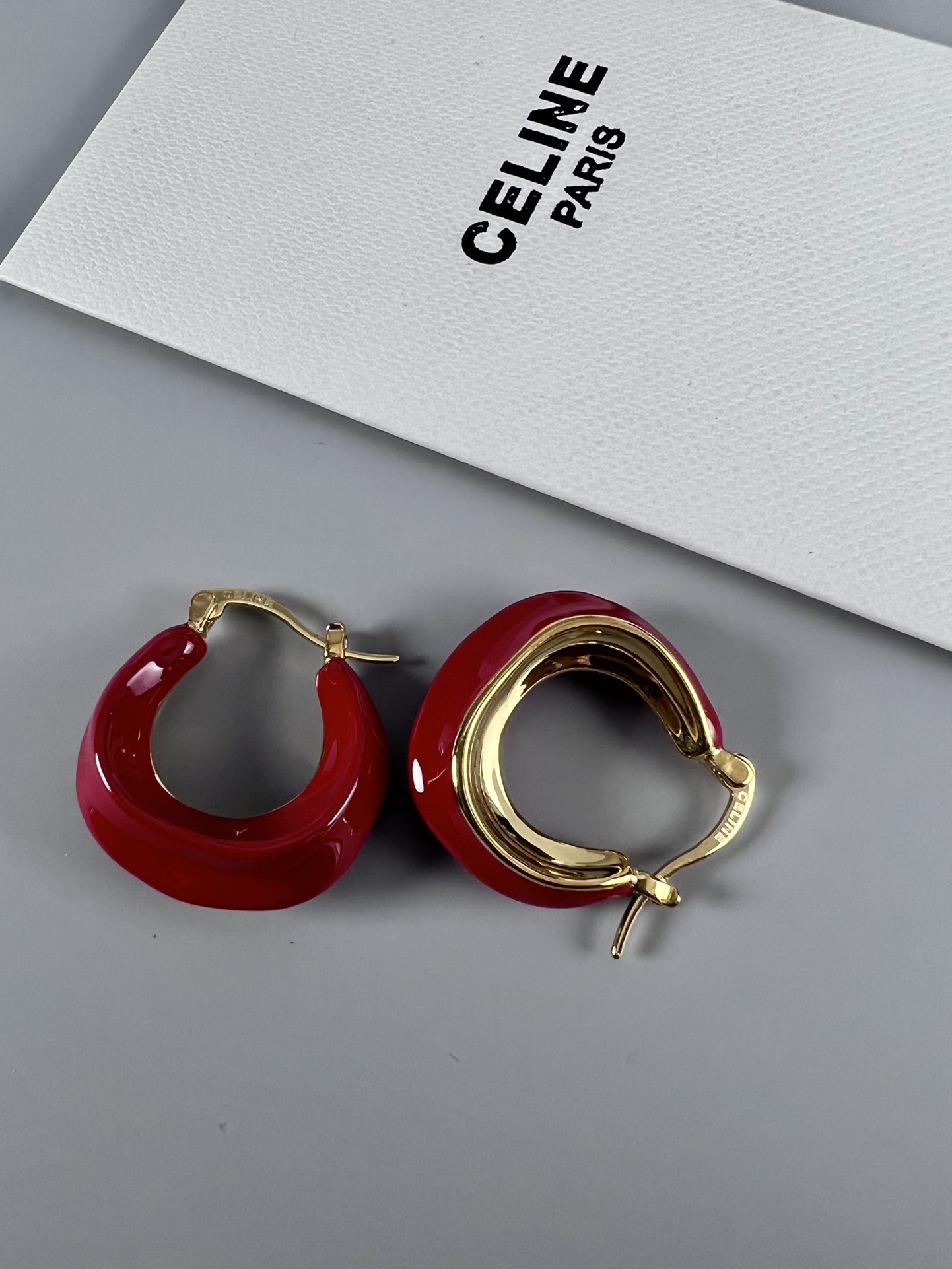 Celine Layered Hoop Earrings earrings Gold-tone metal one variant with navy blue enamel one variant in polished gold 2 5cm diameter