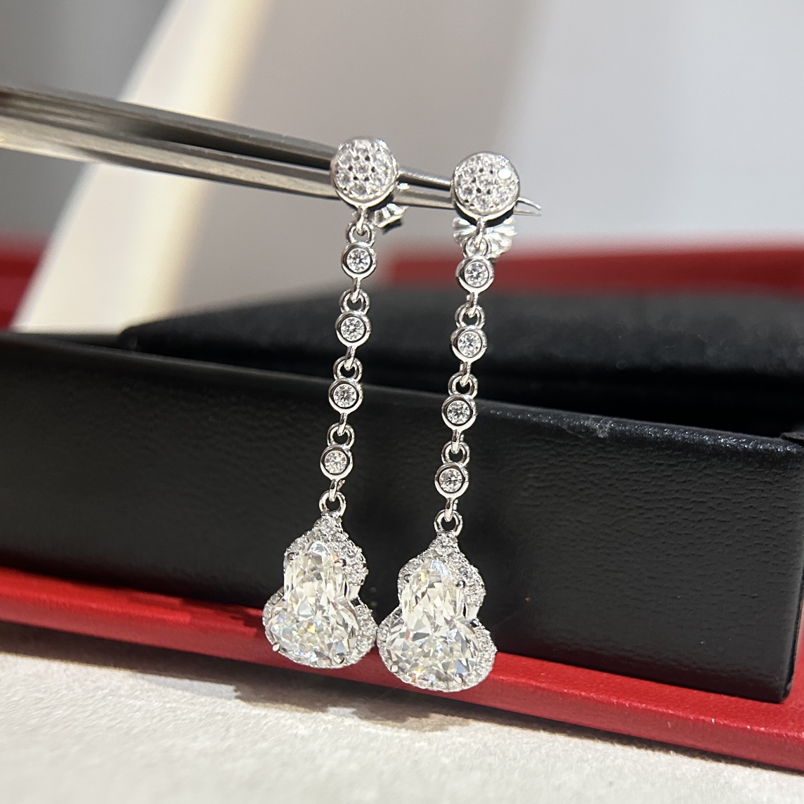 Qeelin Wulu earrings silver-toned metal with clear diamond-like stones 3 5cm drop length