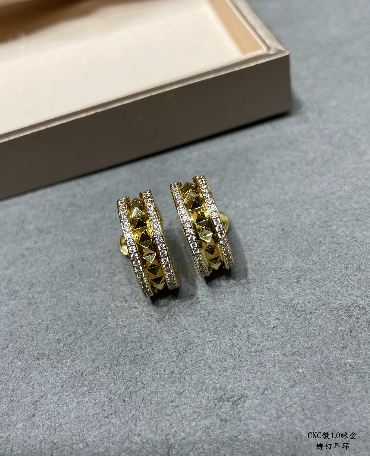 Bvlgari B zero1 Rock earrings 18k yellow gold with clear pave diamonds 18k white gold with clear pave diamonds 15mm outer diameter