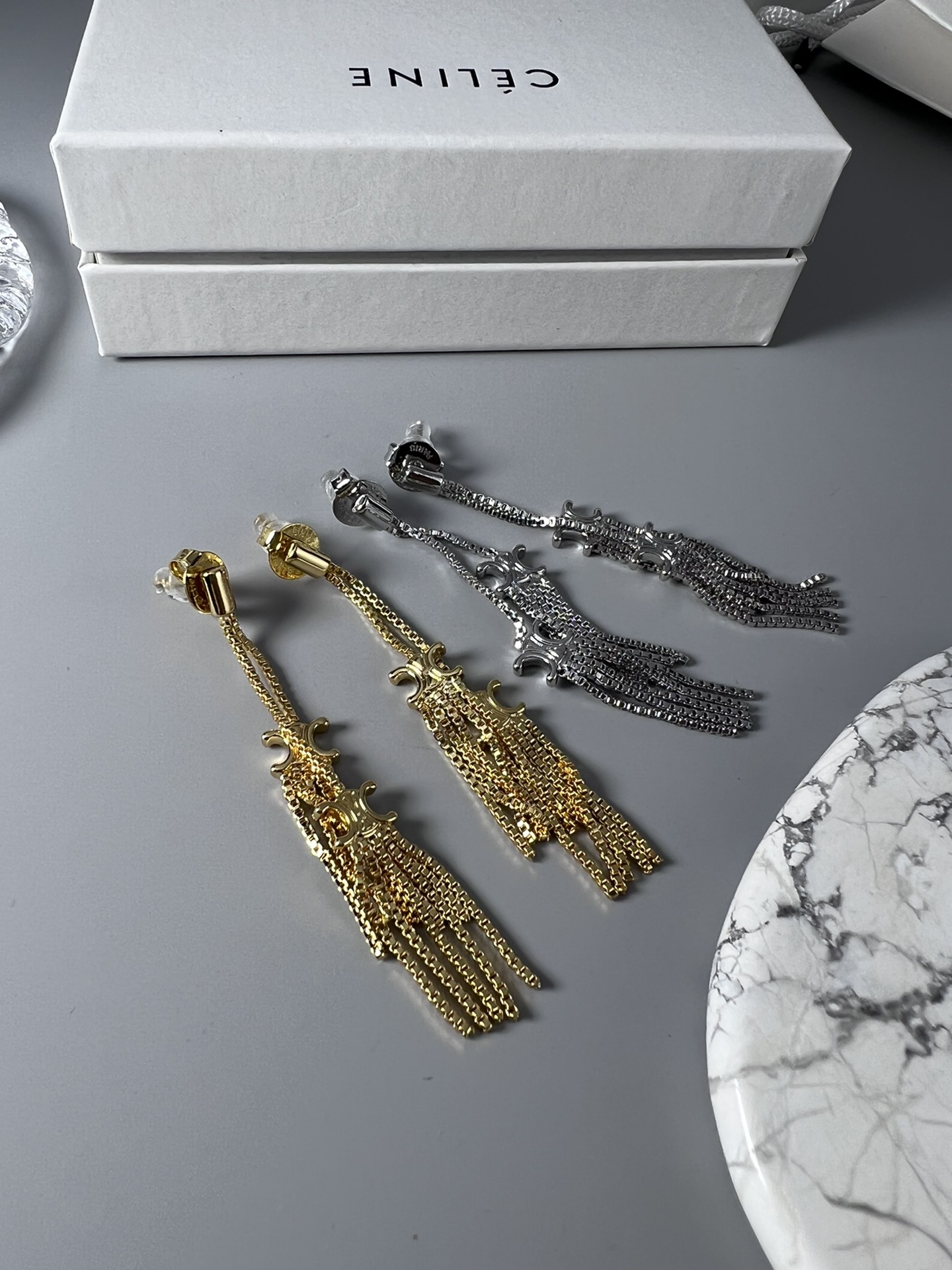 Celine Triomphe Multi-Tassel Chain Drop Earrings earrings Available in polished silver-tone metal and polished gold-tone metal no accent stones 7cm drop length