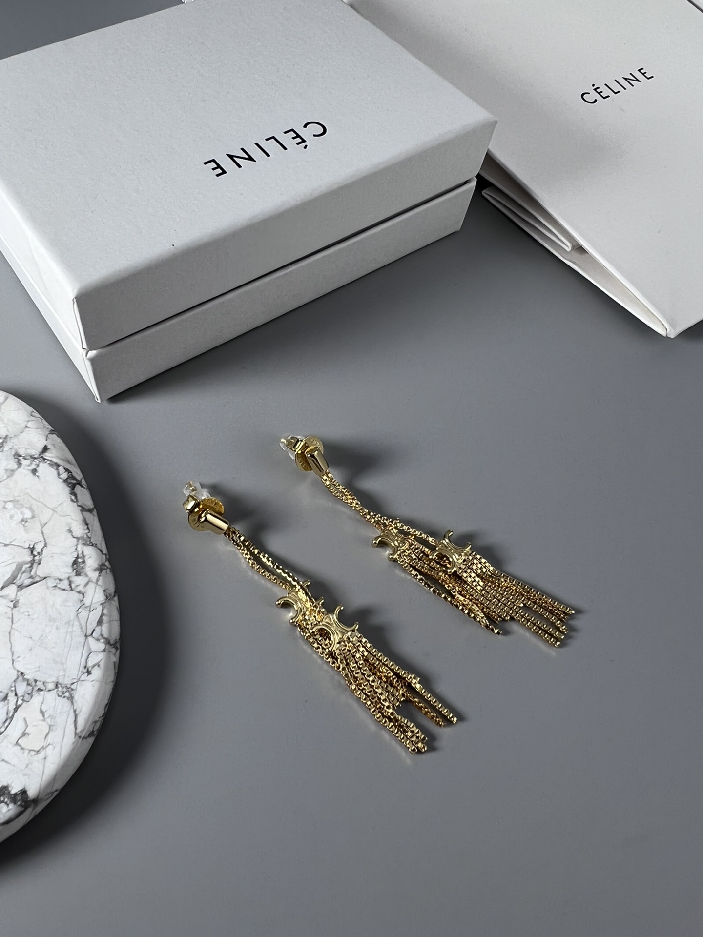 Celine Triomphe Multi-Tassel Chain Drop Earrings earrings Available in polished silver-tone metal and polished gold-tone metal no accent stones 7cm drop length
