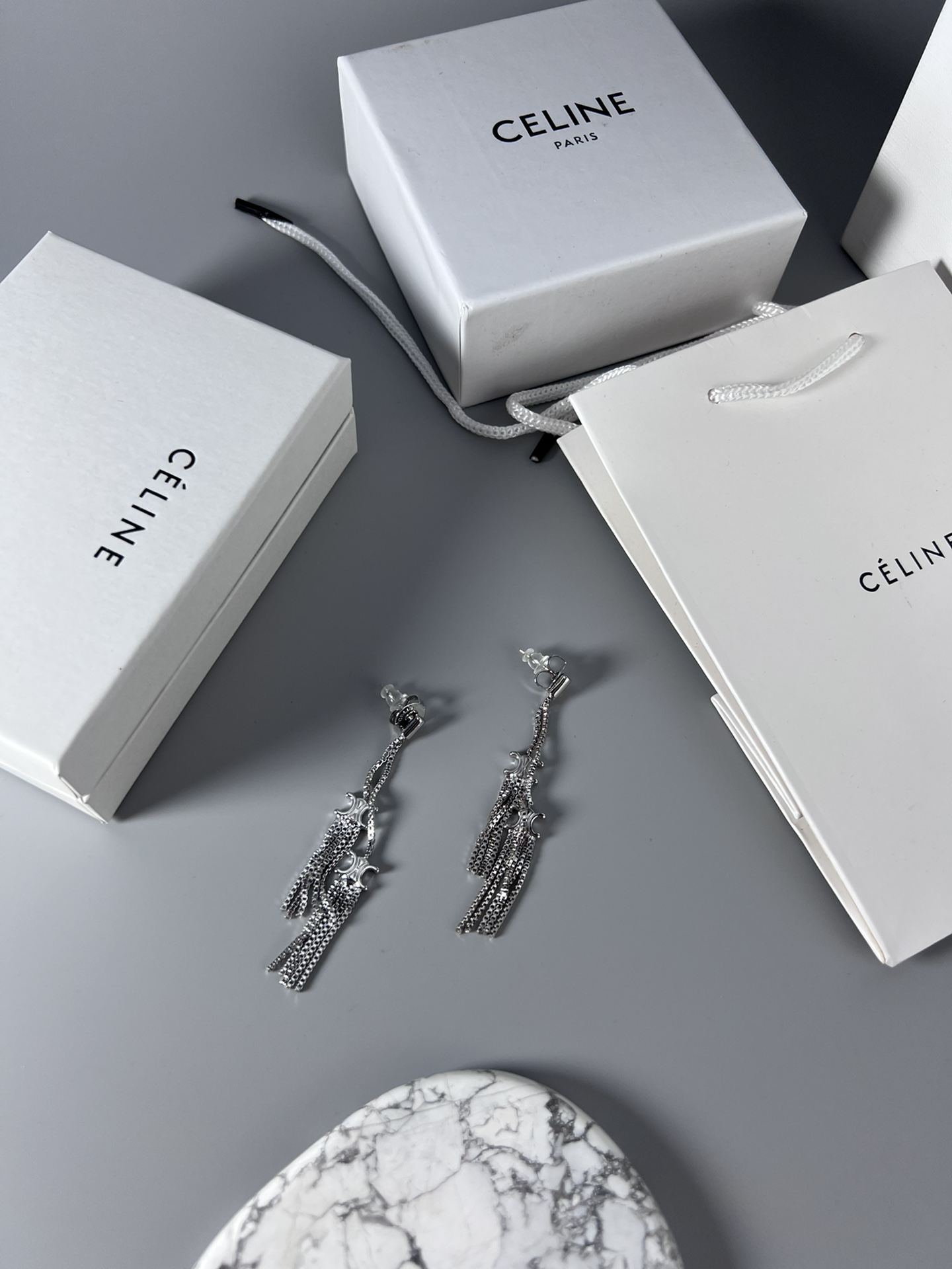 Celine Triomphe Multi-Tassel Chain Drop Earrings earrings Available in polished silver-tone metal and polished gold-tone metal no accent stones 7cm drop length