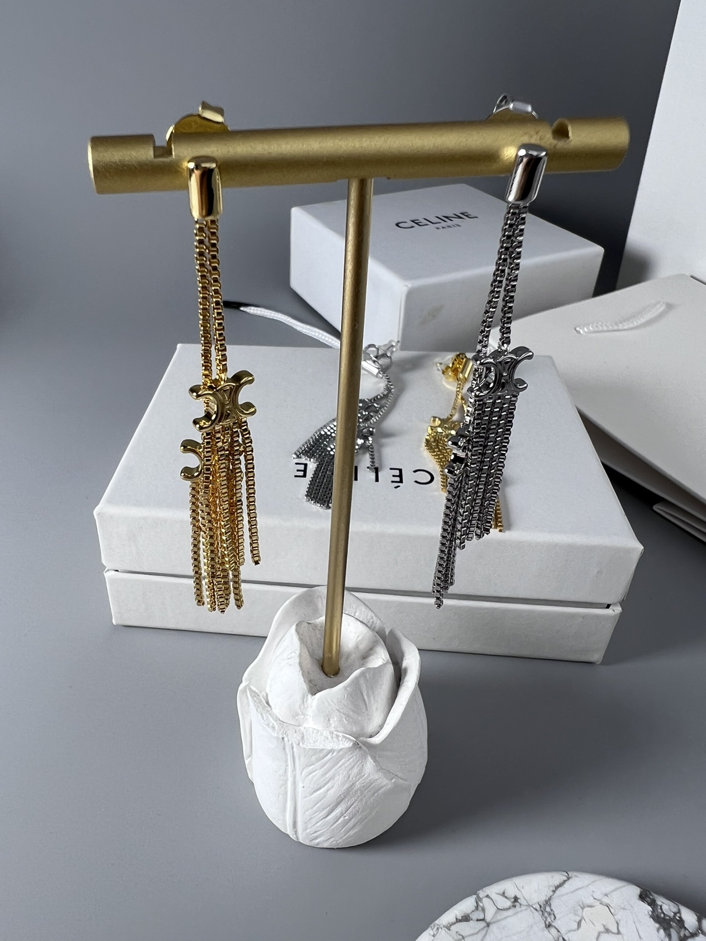 Celine Triomphe Multi-Tassel Chain Drop Earrings earrings Available in polished silver-tone metal and polished gold-tone metal no accent stones 7cm drop length