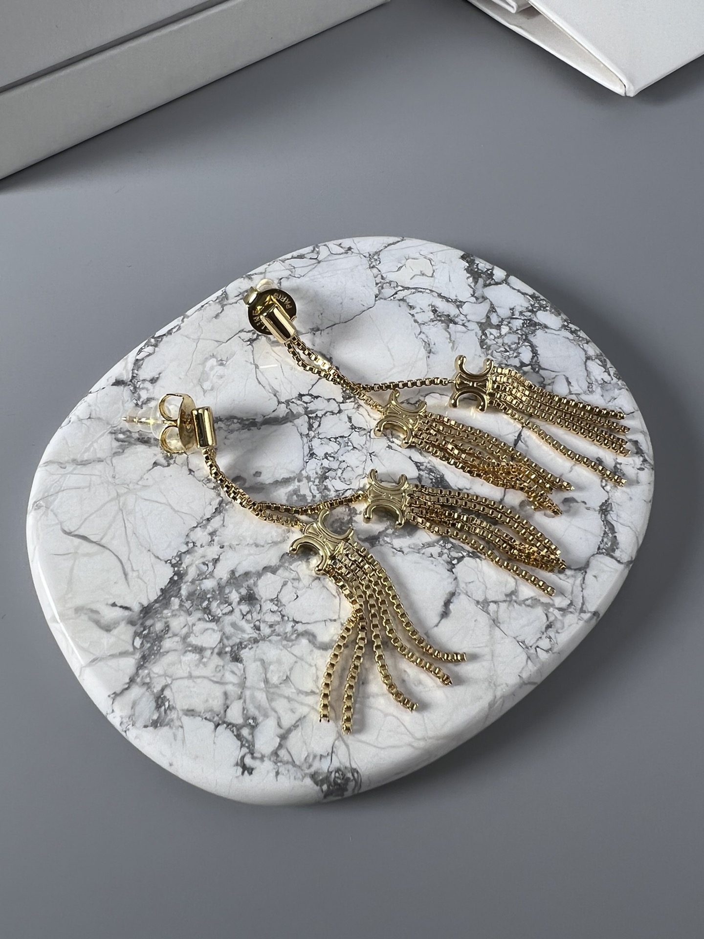 Celine Triomphe Multi-Tassel Chain Drop Earrings earrings Available in polished silver-tone metal and polished gold-tone metal no accent stones 7cm drop length