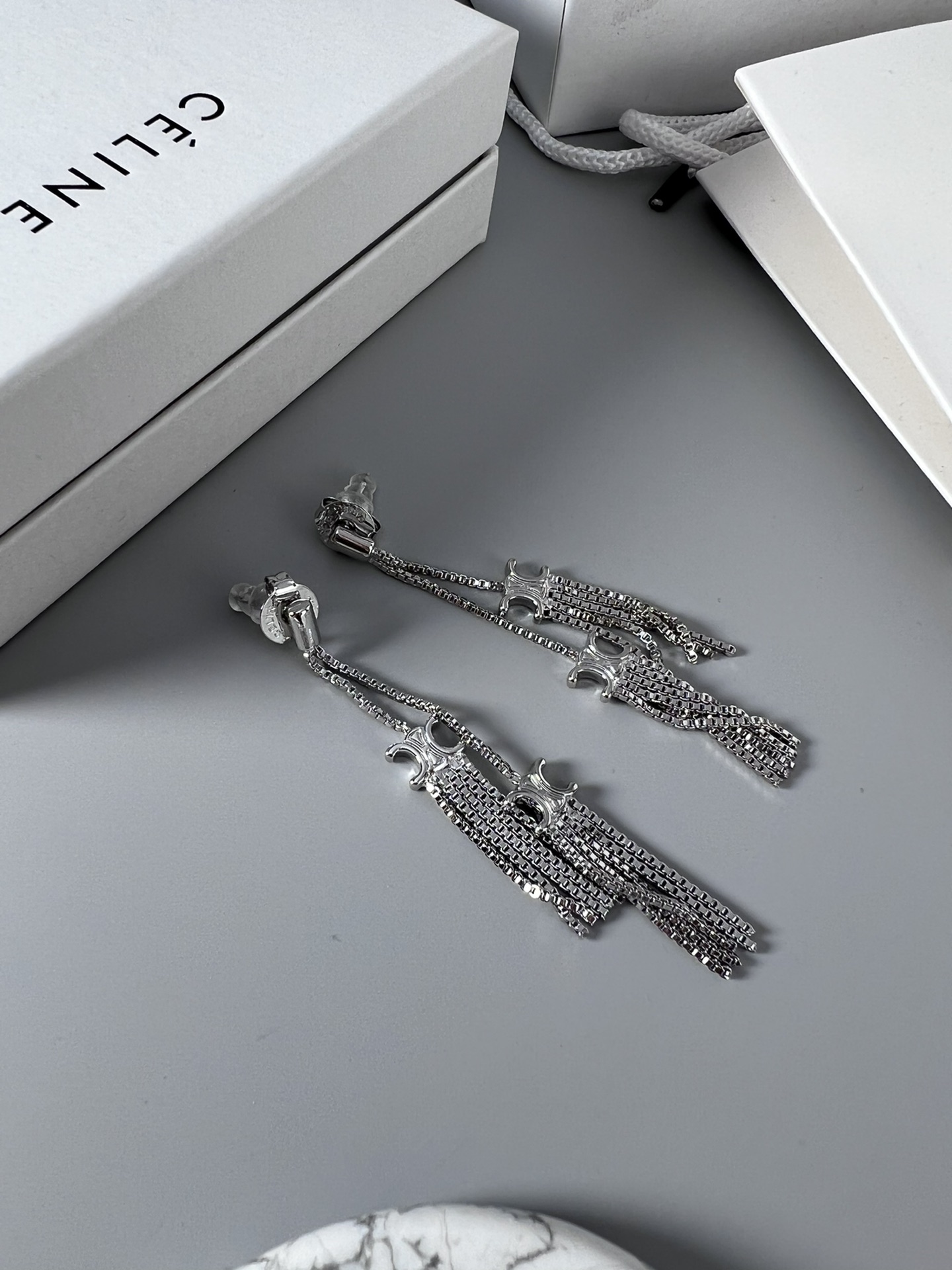 Celine Triomphe Multi-Tassel Chain Drop Earrings earrings Available in polished silver-tone metal and polished gold-tone metal no accent stones 7cm drop length