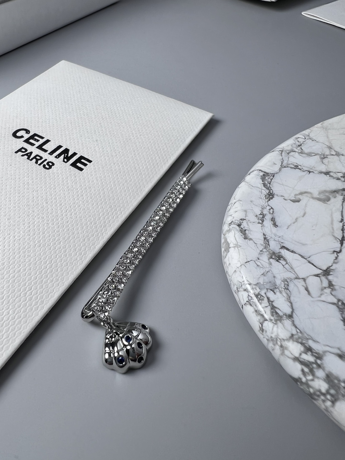 Celine Crystal Shell Charm Bobby Pin brooch Gold-tone metal with clear crystals and dark blue accent stones Silver-tone metal with clear crystals and dark blue accent stones 6cm
