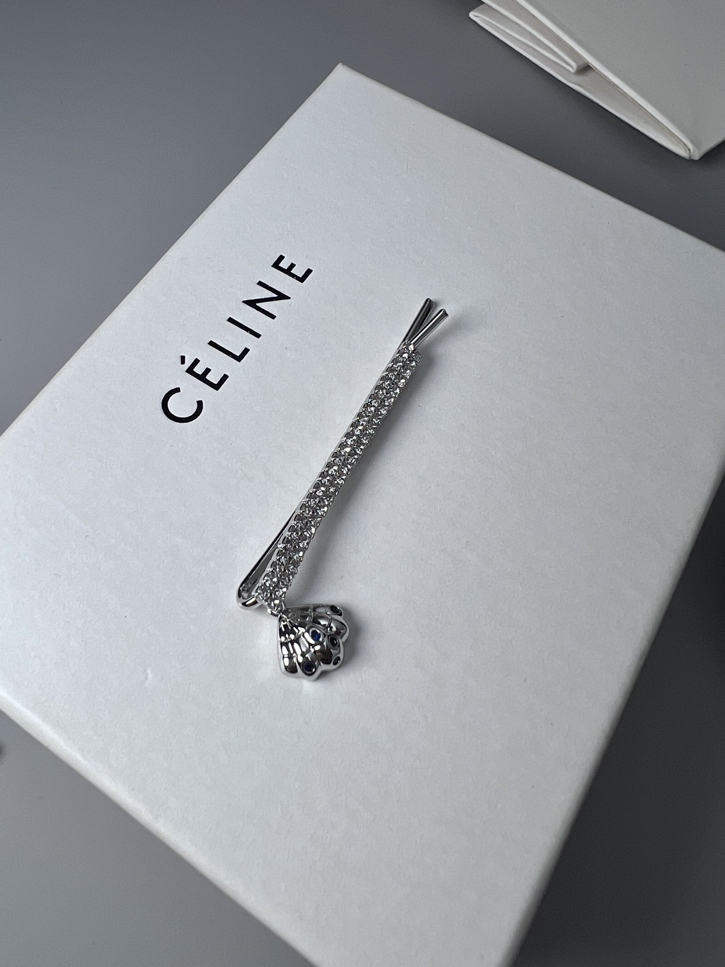 Celine Crystal Shell Charm Bobby Pin brooch Gold-tone metal with clear crystals and dark blue accent stones Silver-tone metal with clear crystals and dark blue accent stones 6cm