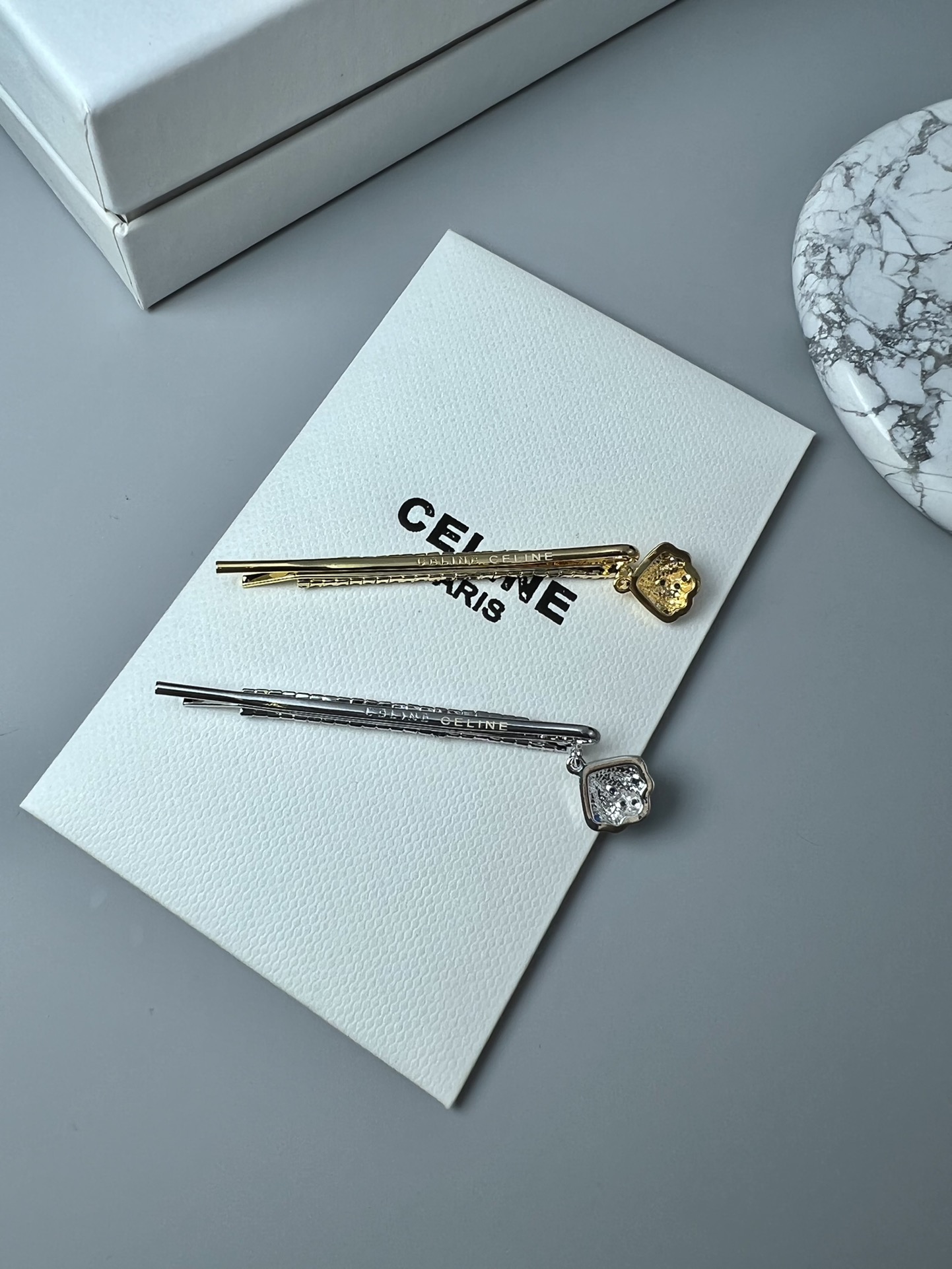 Celine Crystal Shell Charm Bobby Pin brooch Gold-tone metal with clear crystals and dark blue accent stones Silver-tone metal with clear crystals and dark blue accent stones 6cm