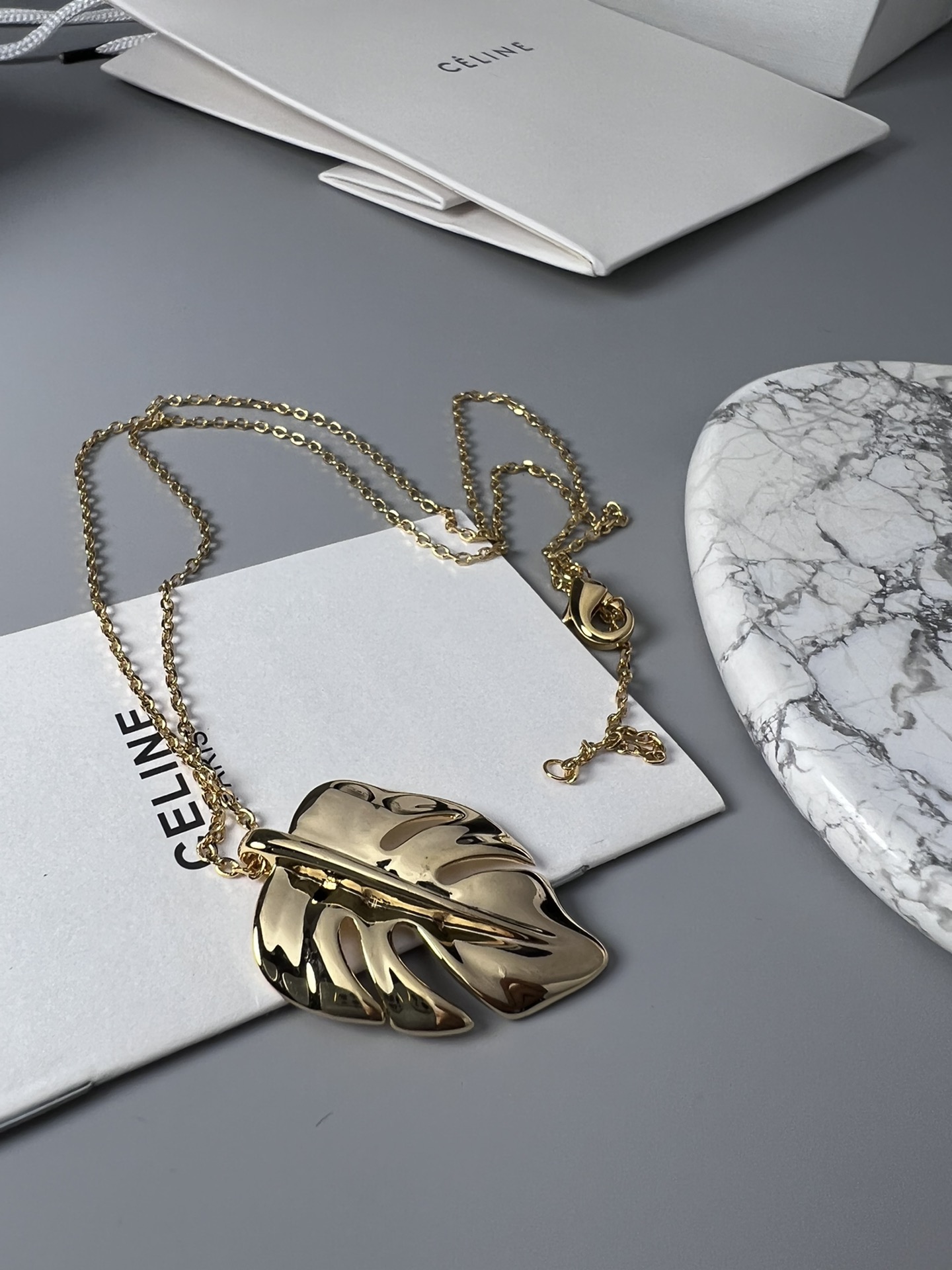 Celine Monstera Leaf Pendant necklace gold-tone metal no additional stones 45cm with 5cm extender