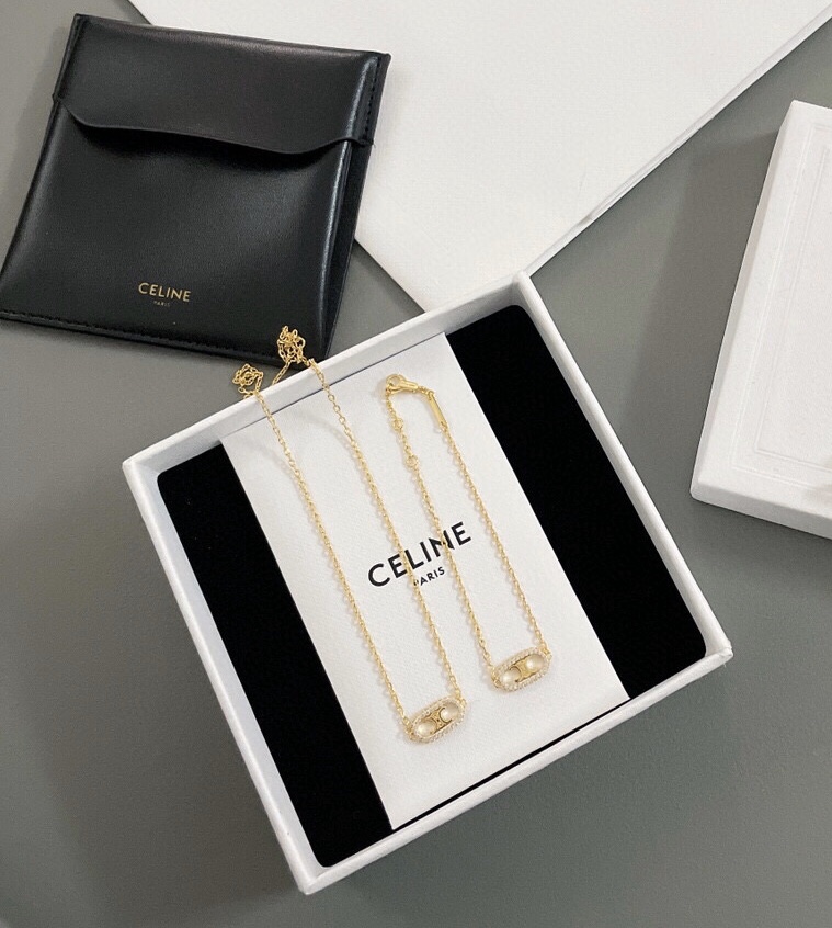 Celine Triomphe Oval Crystal Pearl bracelet gold-tone metal with clear crystals and white pearl accents 18cm