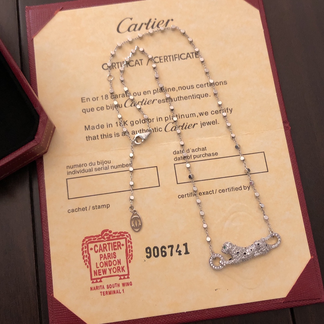 Cartier Panthere de Cartier necklace 18k white gold set with diamonds black onyx spots tsavorite garnet eyes 42cm