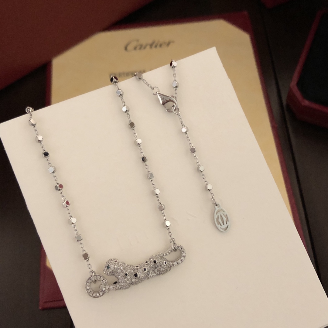 Cartier Panthere de Cartier necklace 18k white gold set with diamonds black onyx spots tsavorite garnet eyes 42cm