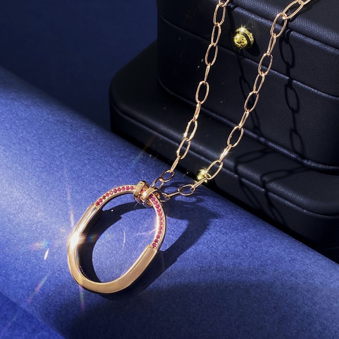 Tiffany Lock Pendant necklace 18k rose gold with pink ruby gemstones 18 inches