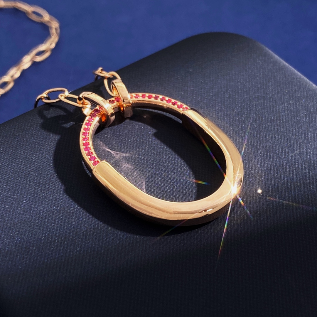 Tiffany Lock Pendant necklace 18k rose gold with pink ruby gemstones 18 inches