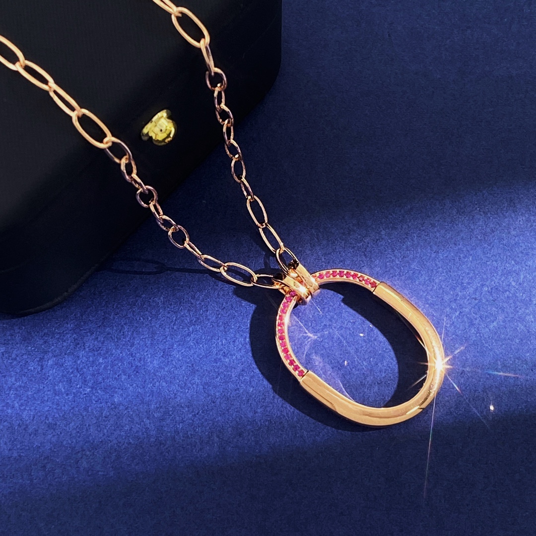 Tiffany Lock Pendant necklace 18k rose gold with pink ruby gemstones 18 inches