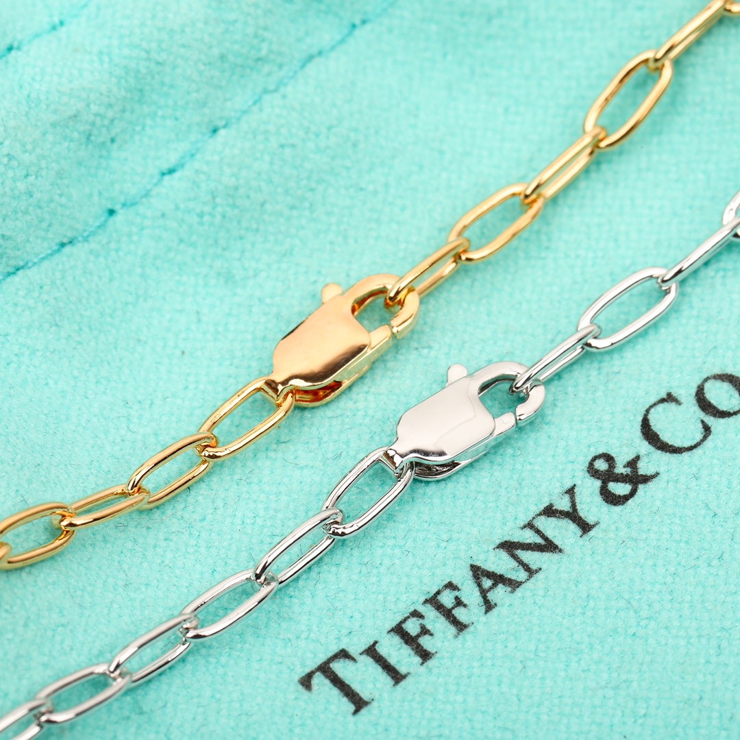 Tiffany Co Tiffany Lock necklace 18K white gold with clear diamonds 18K rose gold with clear diamonds 18 inches