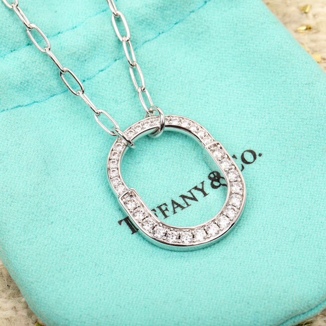 Tiffany Co Tiffany Lock necklace 18K white gold with clear diamonds 18K rose gold with clear diamonds 18 inches
