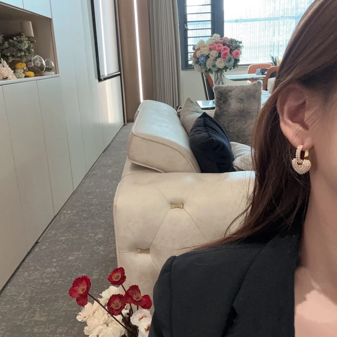 Celine Pearl Heart Charm Huggie Hoop Earrings earrings gold-tone metal with white faux pearl accents 1 5cm hoop diameter 1 2cm heart charm drop