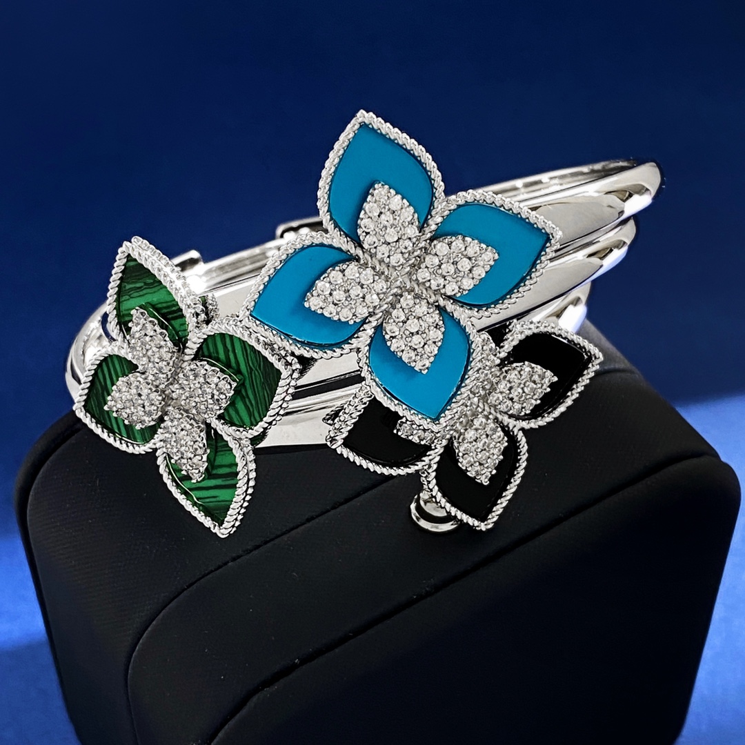 Van Cleef Arpels RC80 bracelet silver-toned metal with diamond-paved flower centers available with green malachite white mother-of-pearl black onyx turquoise blue and dark blue lapis lazuli petal inlays 17cm