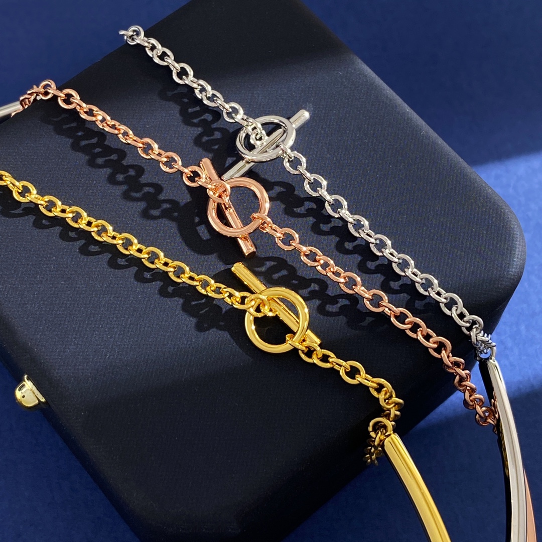 Tiffany Knot necklace silver-toned metal with clear pave stones rose gold-toned metal with clear pave stones yellow gold-toned metal with clear pave stones 16 inches with 2 inch extender