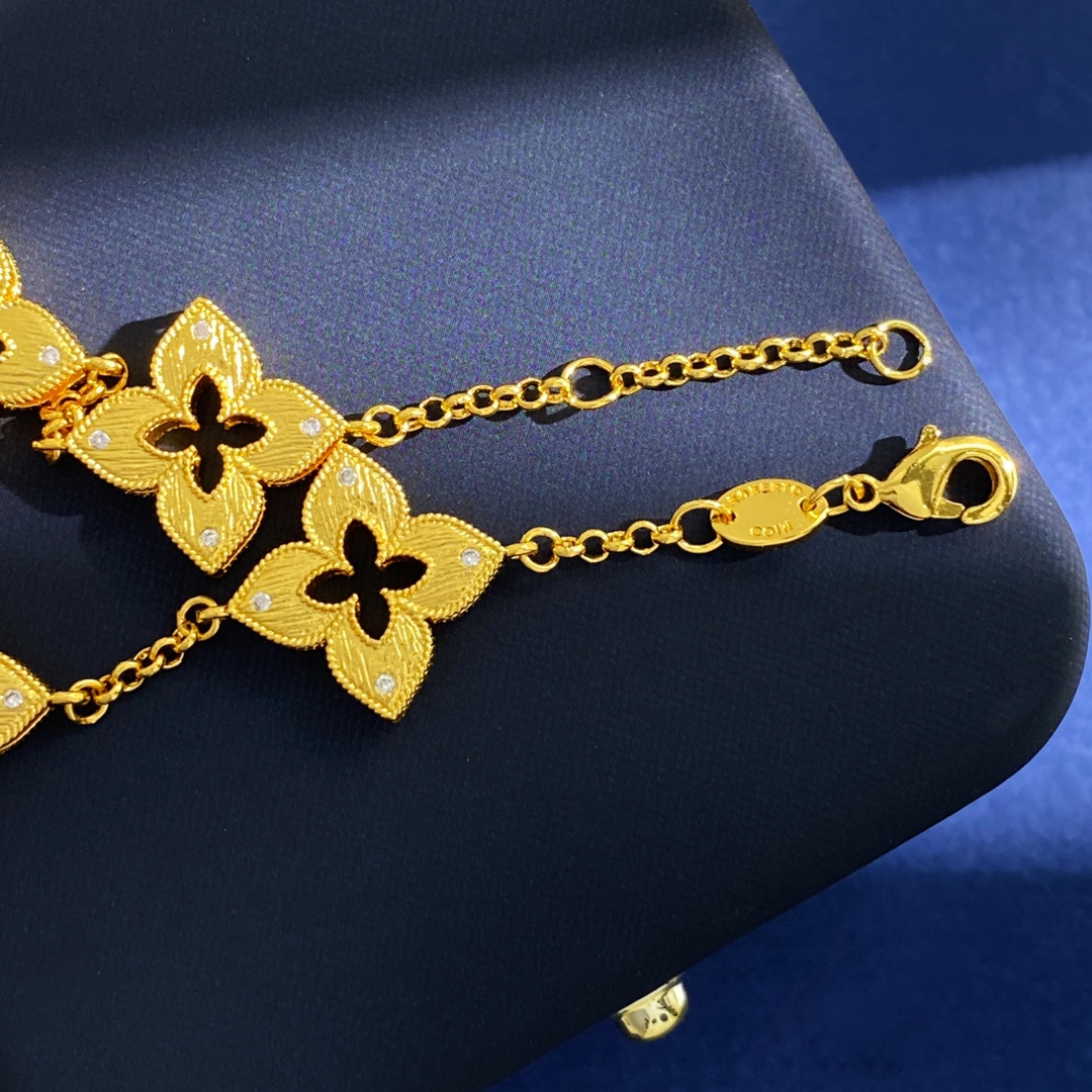 Van Cleef Arpels Venetian Flower bracelet Yellow gold with clear diamond accents and red enamel detail 18cm